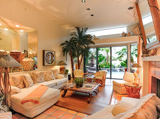 living room overlooks pool area